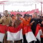 Peluncuran Gerakan Nasional Pembagian 10 Juta Bendera Merah Putih di Lapangan Khatib Sulaiman Bancalaweh, Padang Panjang, Senin (14/8/2023). (Pemko Padang Panjang)