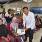 1.300 KPM Kota Pariaman Terima Bantuan Beras 