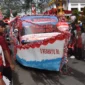Suasana pawai alegori pembangunan di Kota Pariaman. (Foto: Diskominfo Pariaman)