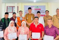 Penyerahan bantuan dari PT Semen Padang kepada Forum Nagari Kelurahan Pampangan Nan XX di Aula LPM Pampangan Nan XX. (Foto: Ist)