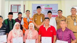 Penyerahan bantuan dari PT Semen Padang kepada Forum Nagari Kelurahan Pampangan Nan XX di Aula LPM Pampangan Nan XX. (Foto: Ist)