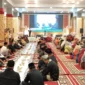 Pj Sekdako Padanmemberikan sambutan saat acara makan bajamba FABN di Gedung Youth Center Padang, Kamis (9/5/2024). 