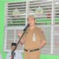 Camat Lubuk Begalung Nofiandi Amir menjadi pembina upacara di MTsN 4 Padang. (Foto: Humas Kecamatan Lubeg)
