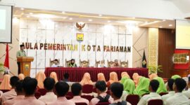 Asisten Administrasi Pembangunan dan Umum Setdako Pariaman, Elfis Candra membuka Sosialisasi Program Saga Saja di Aula Balaikota Pariaman, Jumat (18/10/2024). (Foto: Diskominfo Pariaman)