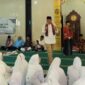 Camat Lubeg Nofiandi Amir saat menghadiri Khatam Al Quran Majelis Taklim Masjid Darul Hikmah (Surau Batu) Kelurahan Batuang Taba Nan XX, Minggu (17/11/2024). (Foto: Ist)