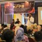 Camat Lubeg Nofiandi Amir membakar semangat para peserta Bimtek KPPS se-Kecamatan Lubeg di Fave Hotel Padang, Minggu (10/11/2024). (Foto: Ist)