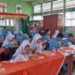Para siswa SDN 19 Koto Pulai, Kecamatan Koto Tangah terlihat antusias menyantap makanan bergizi yang disajikan. (Foto: FB Diskominfo Padang)