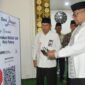 Pj Sekdako Padang Yosefriawan meluncurkan gerakan wakaf uang bagi ASN. (Foto: Prokopim Padang)