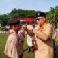Pj Wali Kota Padang Andree Algamar membuka Jambore Ranting Gerakan Pramuka Kwarran Bungtekab di Bumi Perkemahan TPI Bungtekab, Jumat (15/11/2024). (Foto: Prokopim Padang)