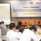 Pj Sekdako Padang Yosefriawan menyampaikan sambutan saat temu ramah bersama pelaku usaha di Santika Premiere Hotel, Jumat (13/12/2024). (Foto: Prokopim Padang)