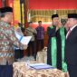 Pj Wali Kota Pariaman, Roberia melantik dan mengambil sumpah Pj Sekdako Pariaman Mursalim, di Aula Balaikota Pariaman, Minggu (15/12/2024). (Foto: Diskominfo Pariaman)