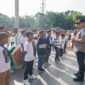 Pj Wali Kota Padang Andree Algamar melepas Tim Sekolah Sepak Bola (SSB) Imam Bonjol Padang untuk mengikuti Kompetisi Liga Anak Indonesia, di Kabupaten Pati, Provinsi Jawa Tengah, Selasa (17/12/2024). (Foto: Prokopim Padang)