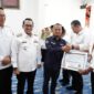 Penyerahan Anugerah Predikat Penilaian Kepatuhan Penyelenggaraan Pelayanan oleh Ombudsman RI, Rabu (19/3/2025). (Foto: Prokopim Tanah Datar)