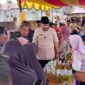 Wali Kota Padang Fadly Amran meninjau pasar murah  di Jalan Asra RT 01 RW 04, Kelurahan Dadok Tunggul Hitam, Kecamatan Koto Tangah, Selasa (4/3/2025). (Foto: Diskominfo Padang)