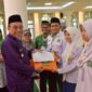 Wakil Wali Kota Padang Maigus Nasir mengukuhkan pengurus Forum Remaja Masjid Agung Nurul Iman untuk masa bakti 2025-2027, Senin (24/3/2025). (Foto: Prokopim Padang)