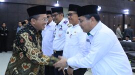Kakanwil Kemenag Sumbar Mahyudin mengajak PPIH Embarkasi Padang membangun sinergi sukseskan haji 2025. (Foto: Humas Kemenag Sumbar)
