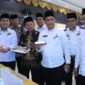 Kemenag Sumbar dan PPIH Embarkasi Padang merekomendasikan rendang dan beras Solok sebagai menu utama jemaah haji dalam penerbangan ke Arab Saudi. (Foto: Humas Kemenag Sumbar)