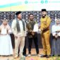 Wali Kota Padang Fadly Amran menghadiri Sosialisasi Pengadministrasian dan Pendaftaran Tanah Ulayat yang digelar Kementerian ATR/BPN di Auditorium UNP, Senin (28/4/2025). (Foto: Prokopim Padang)