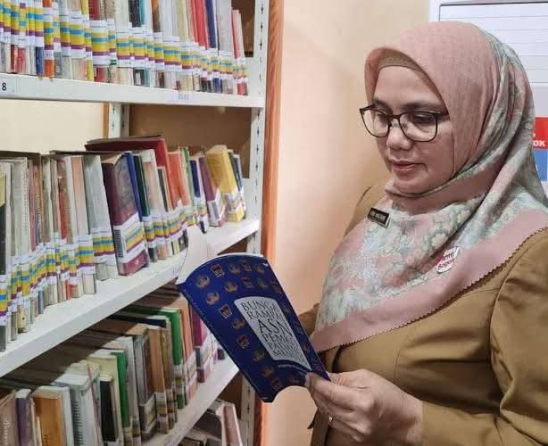 Kepala Dinas Perpustakaan dan Kearsipan Kota Padang, Feri Mulyani Hamid. (Foto: FB Diskominfo Padang)