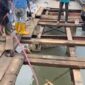 Pemko Padang melakukan perbaikan Jembatan Gunung Nago. (FB: Diskominfo Padang)