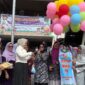 Bunda PAUD Kota Padang, Ny. dr. Dian Puspita Fadly Amran, Sp.JP menghadiri tari massal murid TK se-Kota Padang di RTH Imam Bonjol, Kamis (24/4/2025). (Foto: Prokopim Padang)