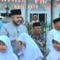 Wali Kota Padang, Fadly Amran melepas pawai ta’aruf Khatam Alquran dan Wisuda Iqra’ Angkatan ke-XVI MDTA Nurul Ihsan Padang Baru Timur, Minggu (25/5/2025). (Foto: Prokopim Padang)