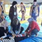 Suasana simulasi kebencanaan di Lapangan RT 03 RW 02 Kelurahan Batang Kabung Ganting, Kecamatan Koto Tangah, Minggu (8/6/2025). (Foto: Prokopim Padang)