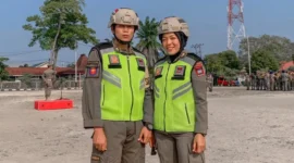 Dua atlet Satpol PP Padang, Nico dan Suci, siap bertanding di PON Bela Diri 2025. (Foto: Humas Satpol PP Padang)