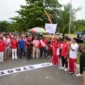 Bupati Padang Pariaman Bupati John Kenedy Azis melepas Gerak Jalan Santai Jantung Sehat, Rabu (13/8/2025). (Foto: Kominfo Padang Pariaman)