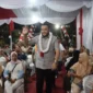 Wali Kota Padang, Fadly Amran menghadiri puncak HUT ke-80 Kemerdekaan RI di Gerbang Jalur II KIP, Kelurahan Surau Gadang, Kecamatan Nanggalo, Sabtu malam (23/8/2025). (Foto: Prokopim Padang)