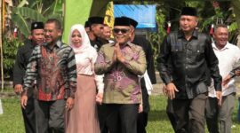 Bupati Pasbar Yulianto menghadiri tasyakuran penerimaan warga baru PSHT Ranting Kinali, Kecamatan Kinali, Minggu (24/8/2025). (Foto: Diskominfo Pasbar)