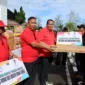 Wali Kota Pariaman Yota Balad meluncurkan program unggulan Satu Keluarga Satu Industri Rumah Tangga (IRT) di halaman Balai Kota Pariaman, Jumat (29/8/2025). (Foto: Kominfo Pariaman)