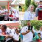 Wali Kota Pariaman Yota Balad menyerahkan seragam sekolah gratis bagi murid baru kelas I di empat SDN di Kota Pariaman, Rabu (20/8/2025). (Foto: Kominfo Pariaman)