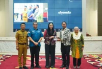 Bupati Dharmasraya, Annisa Suci Ramadhani saat meresmikan Program Pengembangan Kompetensi Guru Bahasa Inggris (PKGBI) 2025, Selasa (9/9/2025). (Foto: Pemkab Dharmasraya)