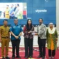 Bupati Dharmasraya, Annisa Suci Ramadhani saat meresmikan Program Pengembangan Kompetensi Guru Bahasa Inggris (PKGBI) 2025, Selasa (9/9/2025). (Foto: Pemkab Dharmasraya)