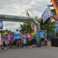 Wakil Wali Kota Padang, Maigus Nasir melepas peserta Fun Run HJK Padang ke-356 di Pantai Padang, Minggu (3/8/2025). (Foto: FB Diskominfo Padang)