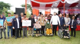 Wali Kota Padang, Fadly Amran menghadiri puncak peringatan HUT ke-65 Karang Taruna di Lapangan Upacara Balai Kota Aie Pacah, Jumat (26/9/2025). (Foto: Prokopim Padang)