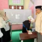 Dinas Perpustakaan dan Kearsipan (DPK) melakukan pendataan perpustakaan masjid, Jumat (26/9/2025). (Foto: Kominfo Padang Panjang)