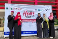 Ketua TP-PKK Kota Padang, Ny. Dian Puspita Fadly Amran Sp.JP, menghadiri puncak Peringatan WHD Tingkat Sumbar 2025 di halaman Kantor Gubernur Sumbar, Minggu (28/9/2025). (Foto: FB Diskominfo Padang)