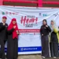 Ketua TP-PKK Kota Padang, Ny. Dian Puspita Fadly Amran Sp.JP, menghadiri puncak Peringatan  WHD Tingkat Sumbar 2025 di halaman Kantor Gubernur Sumbar, Minggu (28/9/2025). (Foto: FB Diskominfo Padang)