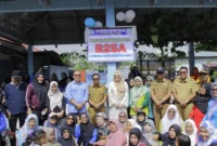 Wakil Bupati Pessel, Risnaldi Ibrahim, Ketua TP-PKK Pessel, Ny Lisda Hendrajoni dan Kepala Dinas Pangan Sumbar Iqbal Ramadipayana foto bersama. (Foto: Dok. Kominfo Pessel)