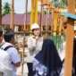 Bupati Dharmasraya, Annisa Suci Ramadhani meninjau proses revitalisasi di SMPN 1 Pulau Punjung dan SDN 05 Koto Salak, Rabu (10/9/2025). (Foto: Pemkab Dharmasraya)