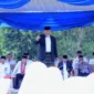 Gubernur Sumbar Mahyeldi Ansharullah memimpin Apel Hari Santri Nasional (HSN) Tingkat Provinsi di Pondok Pesantren Ar Risalah Puteri, Rabu (22/10/2025) pagi. (Foto: Kemenag Sumbar)