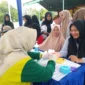 Para ASN dari Dinas Kominfo saat melakukan pengecekan kesehatan di GOR H Ilyas Yakub Painan. (Foto: Dok. Diskominfo)