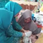 TP-PKK Kabupaten Pasbar menggencarkan sosialisasi Zero Dose di Kecamatan Ranah Batahan, Selasa (7/10). (Foto: Diskominfo Pasbar)