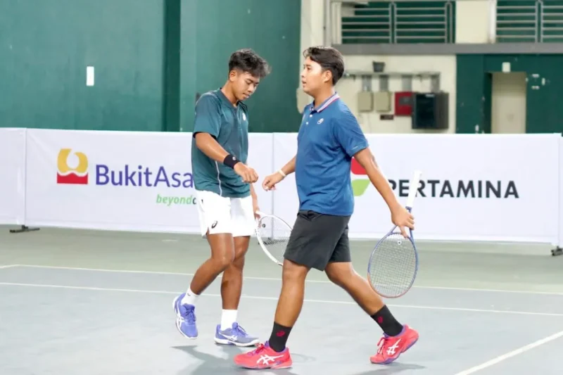 Pasangan ganda tuan rumah, Mazza Hadaduzzikra dan Althafi Haqquzzikra saat pertandingan. (Foto: Dok. AG)