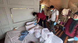 Personel polisi melakukan olah TKP di lokasi kejadian. (Foto: Dok. Polsek Lembah Gumanti)