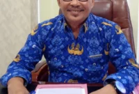 Sekdakab Pessel, Evafauza Yuliasman, SE, MSi, Datuak Tigo Lareh. (Foto: Dok. Evafauza)