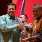 Sekretaris Daerah Provinsi Sumbar, Arry Yuswandi meraih Bhumandala Award 2025 pada acara puncak LAPTARU di Gedung Perpustakaan Nasional, Jakarta, Selasa (18/11/2025). (Foto: ADPSB)