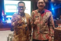 Bupati Pessel, Hendrajoni (kiri) bersama Kadis Kominfo Pessel, Wendi saat menghadiri Digital Trust360 Summit di Jakarta. (Foto: Dok. Kominfo)